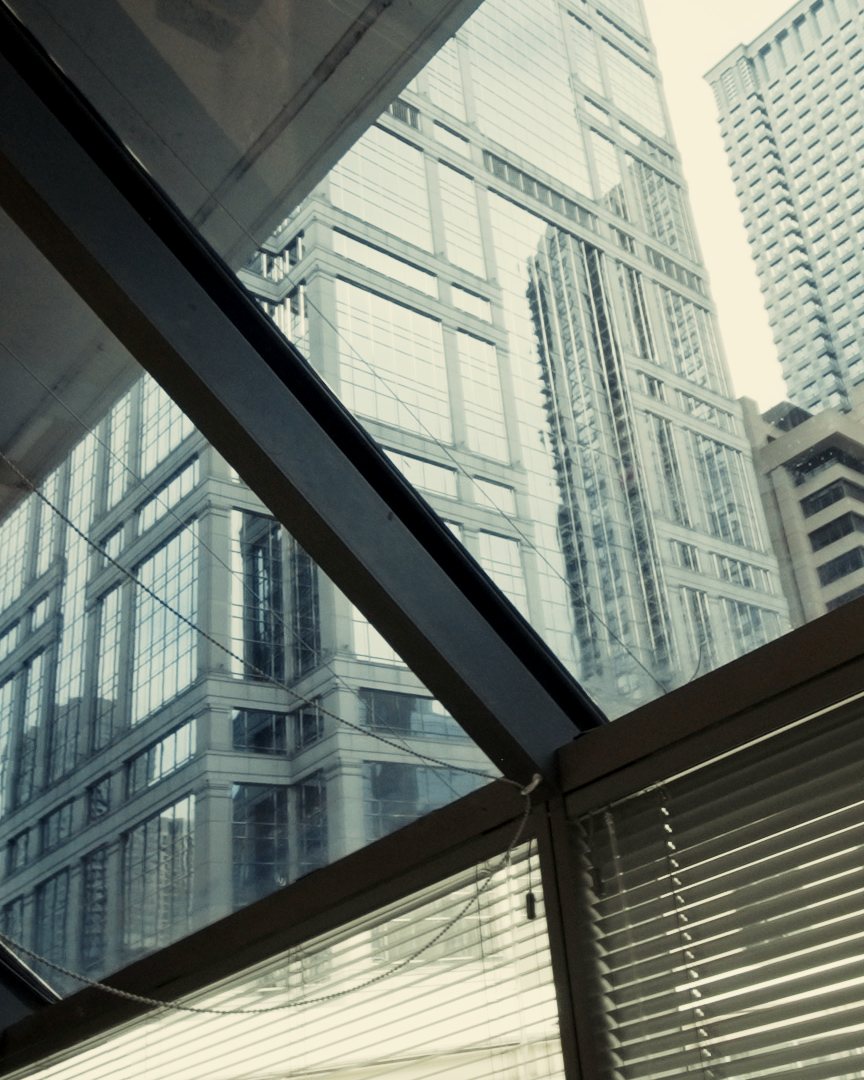 Loop towers seen through the glass from inside the building